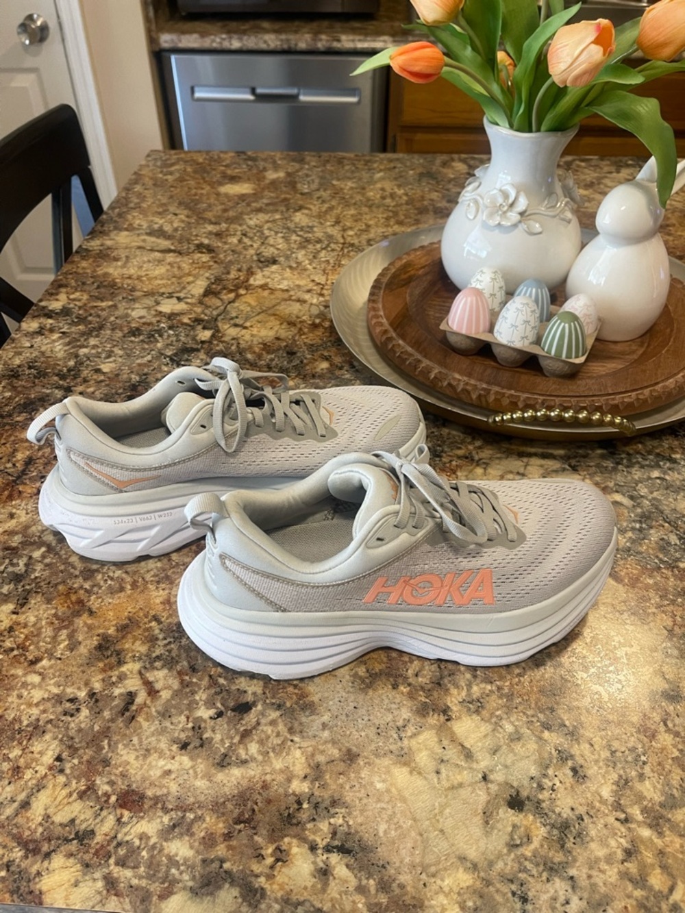 Hoka Women’s Light Gray Athletic Shoes with Orange Accents